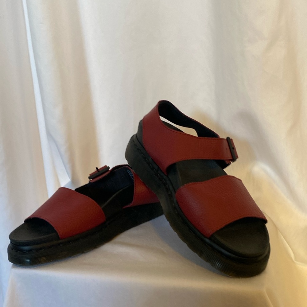 Red Dr.Martens sandals.